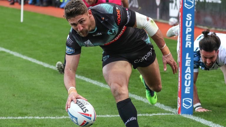 Picture by Manuel Blondeau/SWpix.com - 19/03/2022 - Rugby League - Betfred Super League Round 6 - Toulouse Olympique v St Helens - Stade Ernest-Wallon, Toulouse, France - Tommy Makinson of St Helens scores a try 