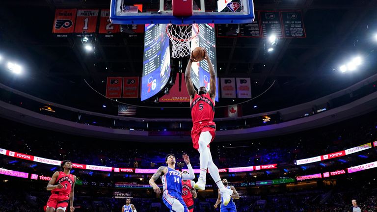 Toronto Raptors&#39; Precious Achiuwa goes up for a dunk during the second half of an NBA basketball game against the Philadelphia 76ers
