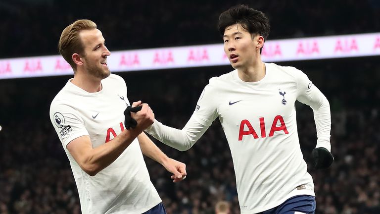 Tottenham&#39;s Heung-Min Son celebrates with Harry Kane after scoring against Everton
