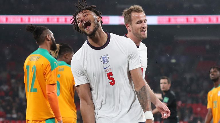 Tyrone Mings wheels away after scoring England's third goal in injury time