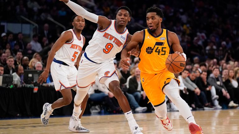 Utah Jazz&#39;s Donovan Mitchell makes a move around New York Knicks&#39; RJ Barrett