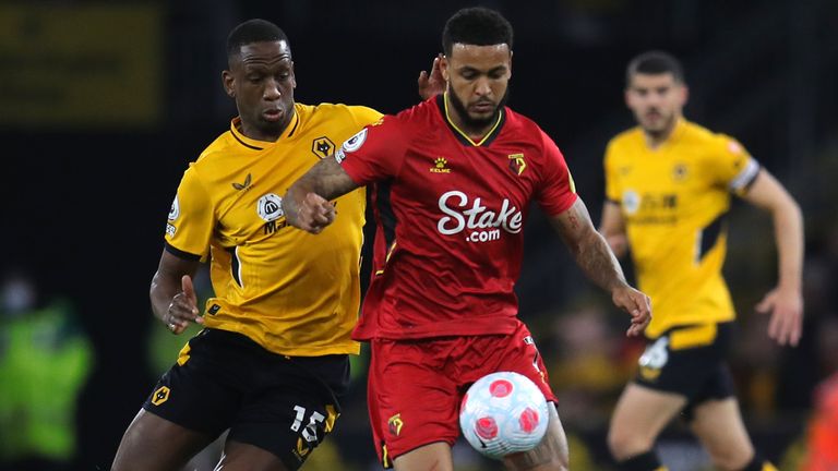 Wolverhampton Wanderers' Willy Boly (left) and Watford's Joshua King battle for the ball