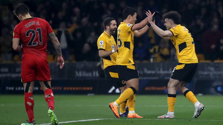 Wolves players celebrate their second of the game, after Watford's Cucho Hernandez (not pictured) scores an own goal