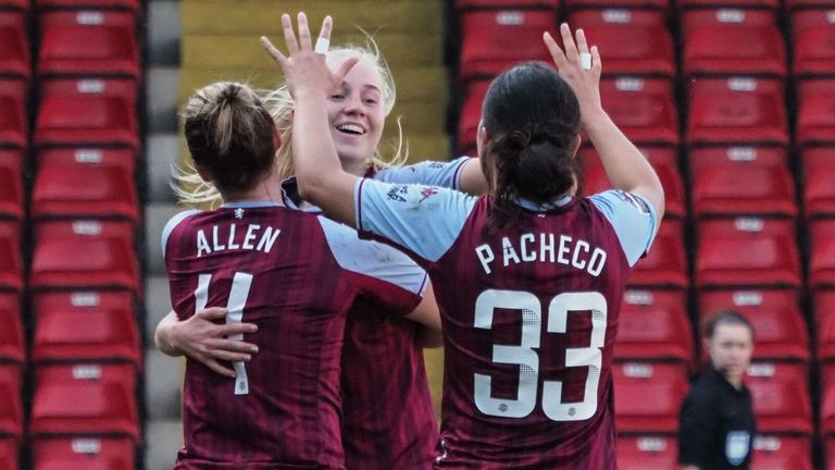 Ramona Petzelberger celebrates with her team-mates after equalising for Aston Villa