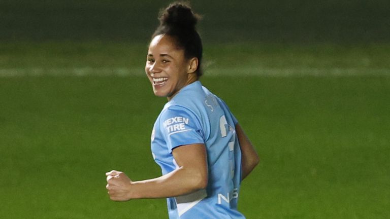 Demi Stokes celebrates after opening the scoring for Man City