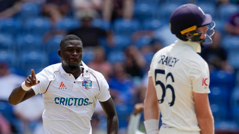 West Indies' Jayden Seales celebrates taking the wicket of England's Zak Crawley