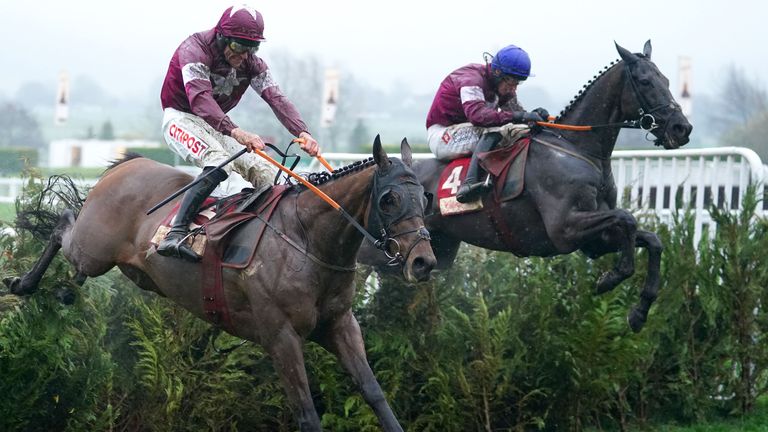 Delta Work ridden by Jack Kennedy (right) goes on to win The Glenfarclas Chase ahead of Tiger Roll 