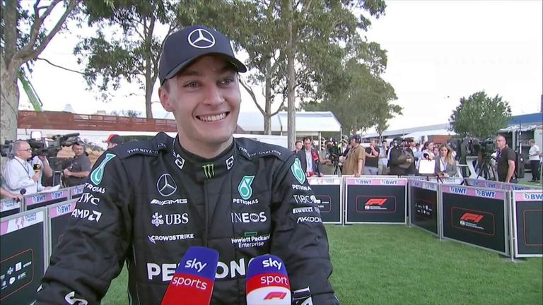 Reaksi George Russell terhadap podium Mercedes pertamanya.