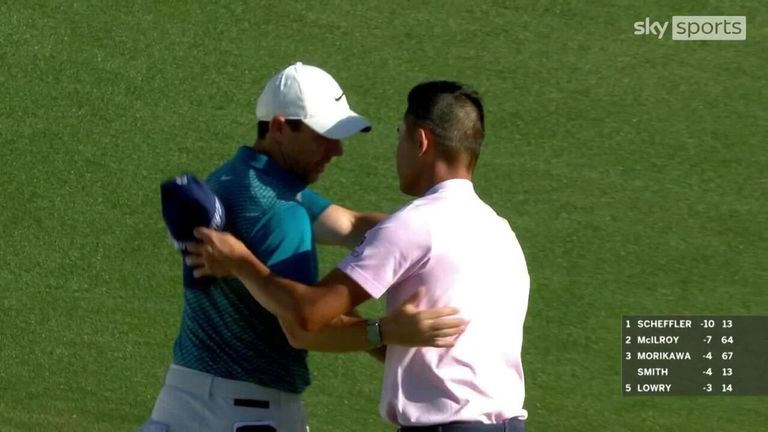 Watch playing partners Rory McIlroy and Collin Morikawa make their way out of the birdie hole from the bunker on the 72nd hole!