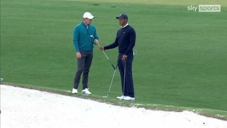 Woods and McIlroy share a conversation as they both practice at Augusta ahead of this week's Masters