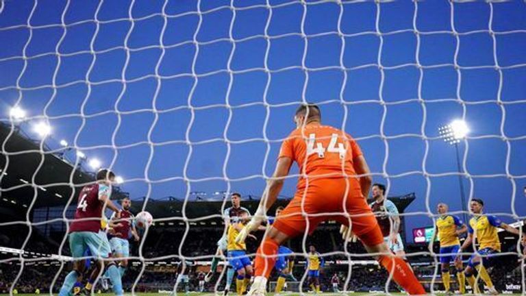 Burnley's Nathan Collins scores their side's second goal of the game during the Premier League match at Turf Moor, Burnley.