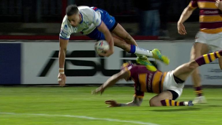 Lewis Murphy takes flight to score for Wakefield Trinity on the stroke of half-time against Huddersfield Giants.