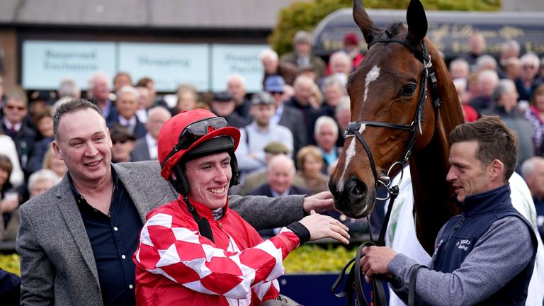Jockey Jack Kennedy celebrates in the parade with Mighty Potter after winning Bective Stud Champion Novice Hurdle on the first day of the Punchestown Festival at Punchestown Racecourse in County Kildare, Ireland.  Date taken: Tuesday, April 26, 2022.