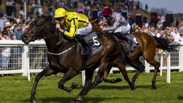 Perfect Power ridden by jockey Christophe Soumillon winning the Watership Down Stud Too Darn Hot Greenham Stakes