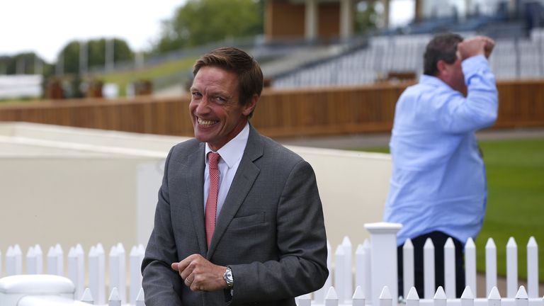 Richard Hughes smiles after Calling The Wind's victory at Goodwood last year