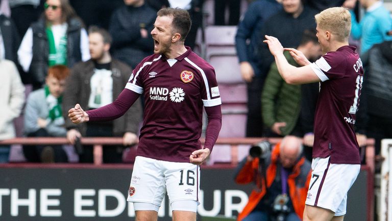 Andy Halliday celebrates after scoring to make it 1-1 in the game between Hearts and Hibs