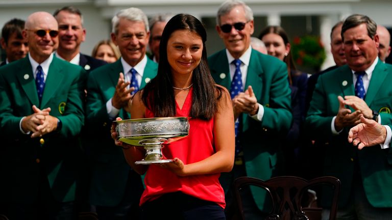 Anna Davis poses with the trophy after winning the Augusta National Women&#39;s Amateur golf tournament, Saturday, April 2, 2022, in Augusta, Ga. (AP Photo/Matt Slocum)