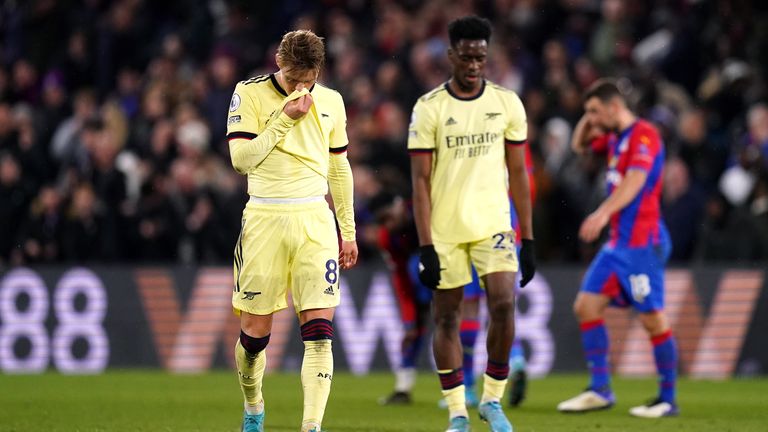 Arsenal players look despondent after their loss to Crystal Palace