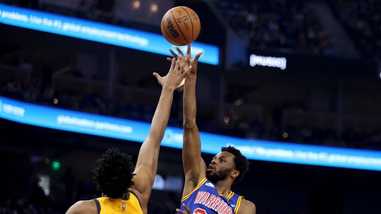 Andrew Wiggins slammed home as Golden State closed the gap on Utah in the third quarter.
