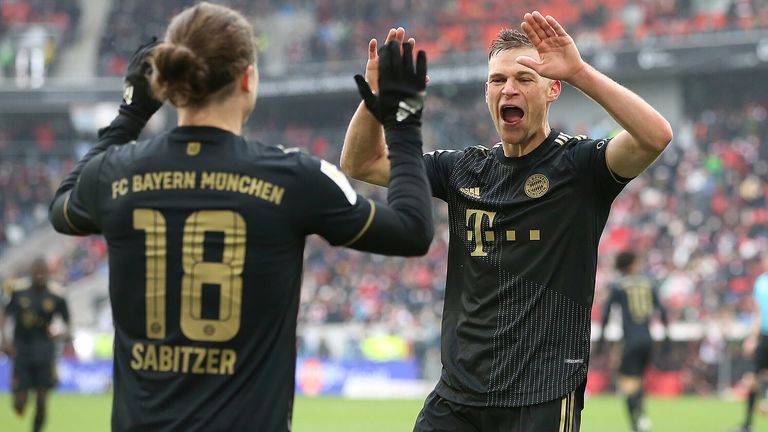Joshua Kimmich celebrates with Marcel Sabitzer during Bayern's 4-1 win at Freiburg