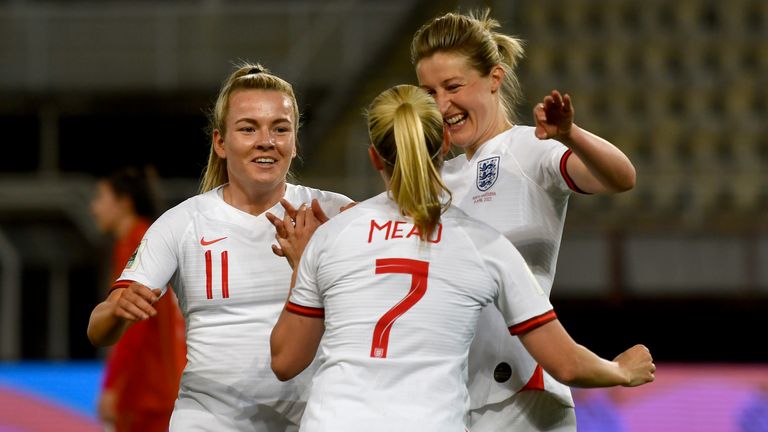 England&#39;s Beth Mead celebrates with team-mates Lauren Hemp and Ellen White after scoring against North Macedonia 