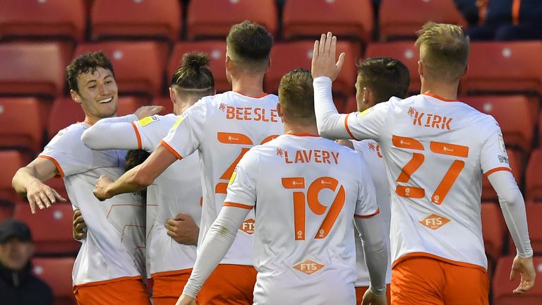 BARNSLEY, ENGLAND - APRIL 26: Blackpool's Owen Dale is congratulated on scoring his team...s first goal during the Sky Bet Championship match between Barnsley and Blackpool at Oakwell Stadium on April 26, 2022 in Barnsley, England. (Photo by Dave Howarth - CameraSport via Getty Images)                                                                                                                     