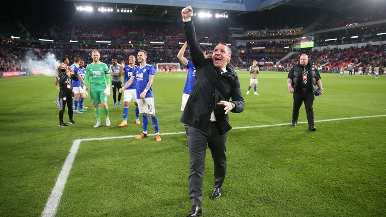 Brendan Rodgers and his Leicester City players celebrate in PSV Eindhoven