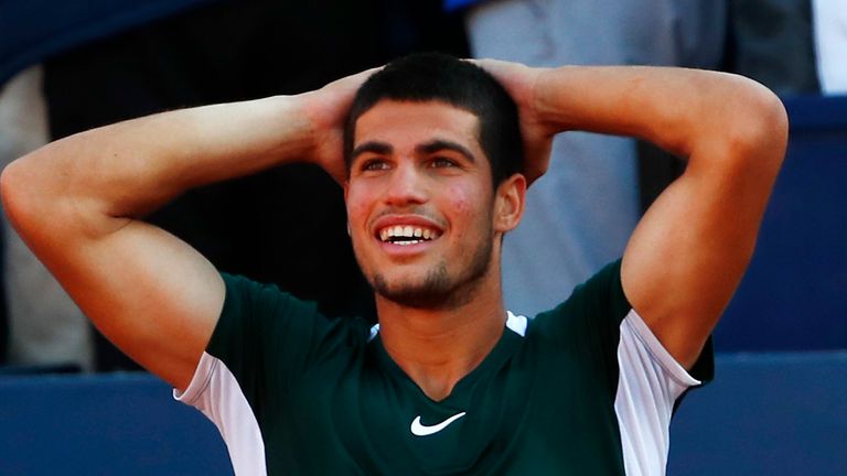 Spain...s Carlos Alcaraz celebrates after winning the ATP Godo Tournament final tennis match against Spain...s Pablo Carreno Busta, in Barcelona, Spain, Sunday, April 24, 2022. (AP Photo/Joan Monfort)                             