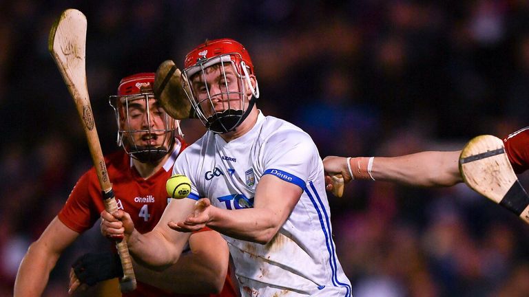 2 April 2022; Carthach Daly of Waterford is tackled by Darragh Fitzgibbon, left, and Ger Millerick of Cork during the Allianz Hurling League Division 1 Final match between Cork and Waterford at FBD Semple Stadium in Thurles, Tipperary. Photo by Ray McManus/Sportsfile