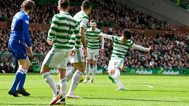 GLASGOW, SCOTLAND - APRIL 9: Reo Hatate of Celtic makes it 1-0 in the Premier League match between Celtic and St Johnstone at Celtic Park, on April 9, 2022, in Glasgow, Scotland.  (Photo by Rob Casey / SNS Group)