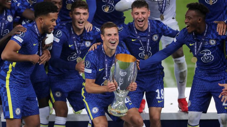 Cesar Azpilicueta lifts the 2021 Super Cup in front of his Chelsea team-mates