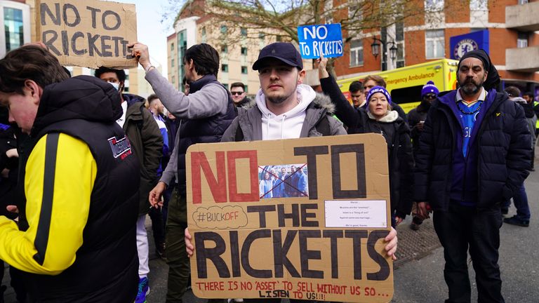 Chelsea fans protest outside the pitch against the club's potential sale to the Ricketts family