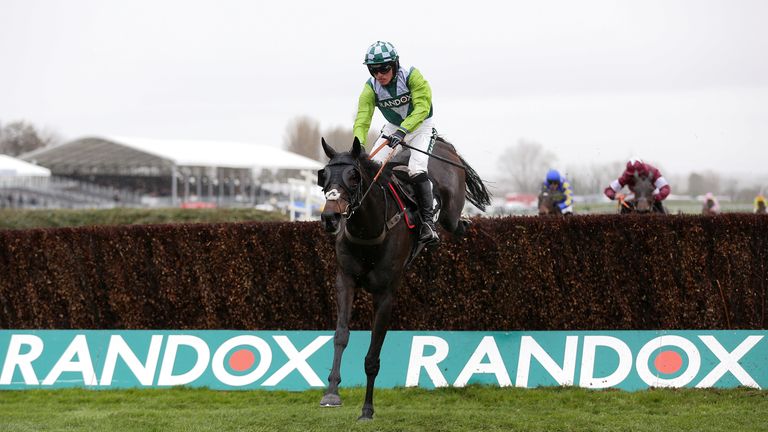 Clan Des Obeaux and Harry Cobden clear the last to win the Betway Bowl at Aintree