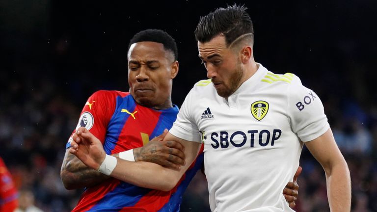 Crystal Palace's Nathaniel Clyne vies with Leeds' Jack Harrison 