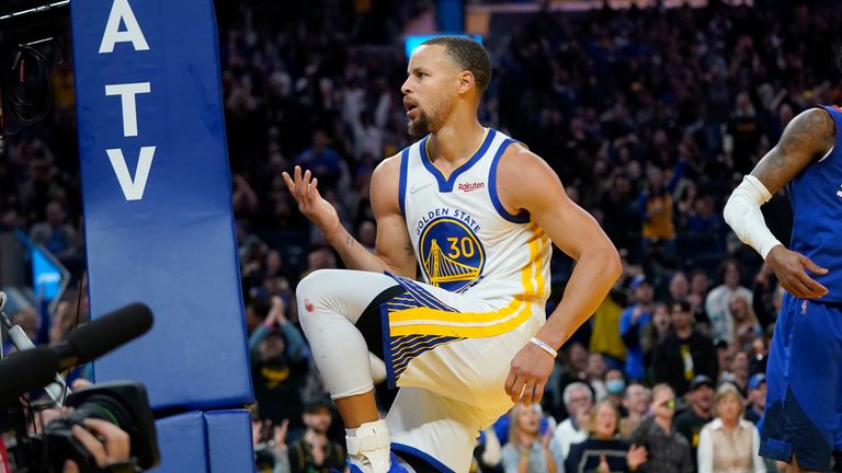 Golden State Warriors guard Stephen Curry celebrates after scoring against the Denver Nuggets during the second half of Game 2 of an NBA basketball first-round playoff series in San Francisco, Monday, April 18, 2022.