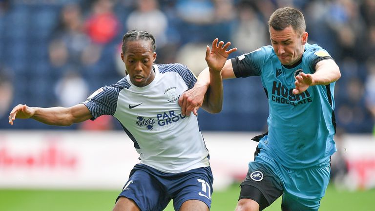 Preston North End&#39;s Daniel Johnson battles with Millwall&#39;s Jed Wallace