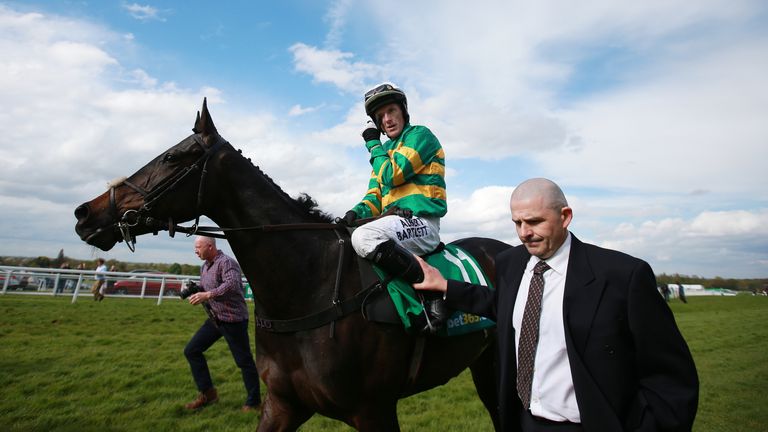 Dave Robert (right) walks in with AP McCoy after the jockey's final ever ride