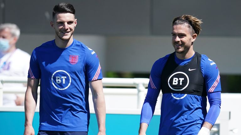 England&#39;s Declan Rice, left, and England&#39;s Jack Grealish arrive for an open training session at St. George&#39;s Park, Burton-upon-Trent, Wednesday June 9, 2021. The Euro 2020 soccer championship gets underway on Friday June 11 and is being played in 11 host cities across 11 countries. The event was delayed by one year after being postponed in 2020 due to the COVID-19 pandemic.