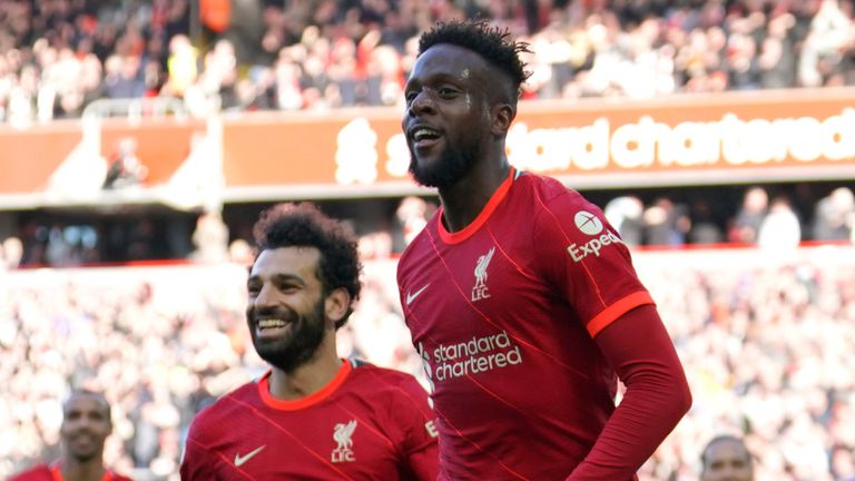 Divock Origi celebrates after putting Liverpool 2-0 up against Everton