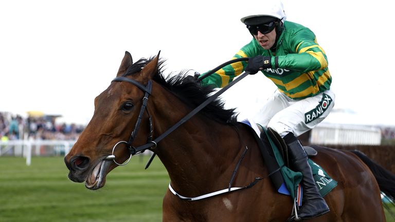Fakir D'Oudairies and Mark Walsh pull clear to win the Marsh Chase at Aintree