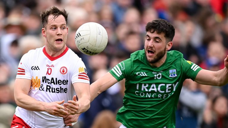 Kieran McGeary of Tyrone in action against Ryan Lyons of Fermanagh