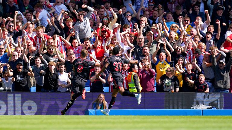 Southampton's James Ward-Prowse celebrates in front of the fans after scoring their side's second goal of the game during the Premier League match at the AMEX Stadium, Brighton.