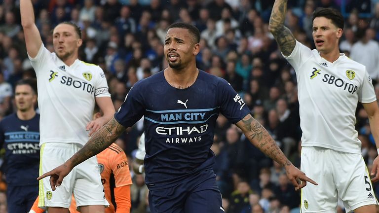 Gabriel Jesus celebrates after scoring his third for Man City (AP)