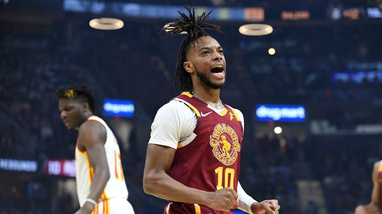 Cleveland Cavaliers&#39; Darius Garland reacts to a basket during the first half of the team&#39;s NBA play-in basketball game against the Atlanta Hawks on Friday, April 15, 2022, in Cleveland.