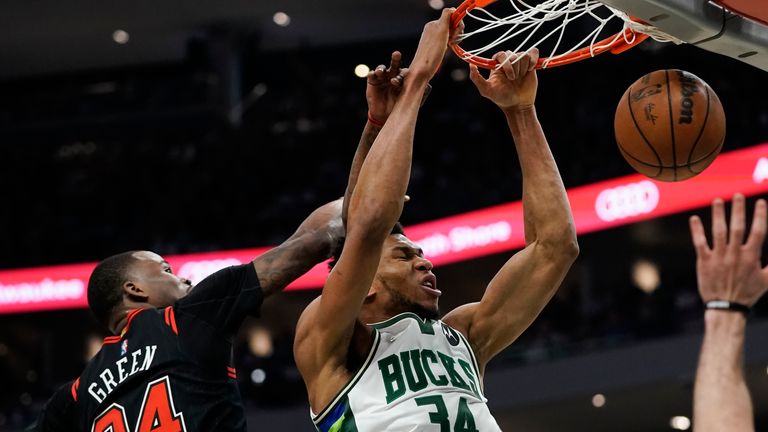 Milwaukee Bucks&#39; Giannis Antetokounmpo dunks past Chicago Bulls&#39; Javonte Green during the first half of Game 1 of their first round NBA playoff basketball game Sunday, April 17, 2022, in Milwaukee.