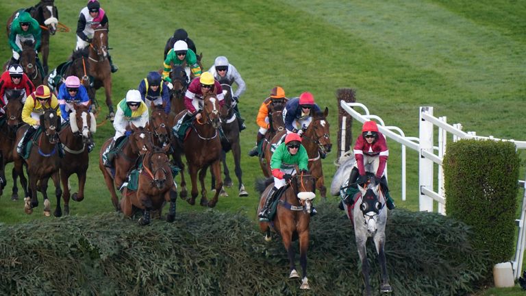 Coko Beach (right) and Two For Gold set a strong pace in the 2022 Grand National