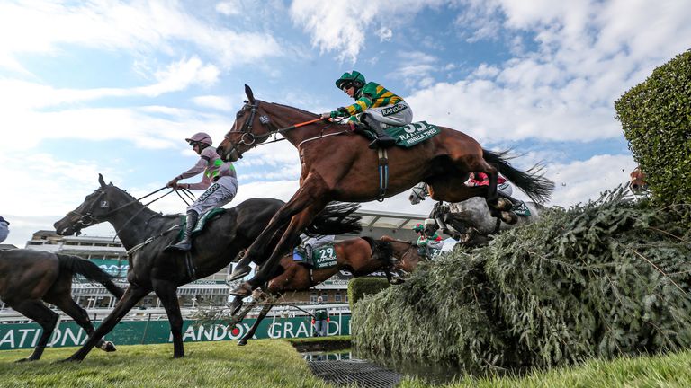 Minella Times on his way to victory in the 2021 Grand National at Aintree