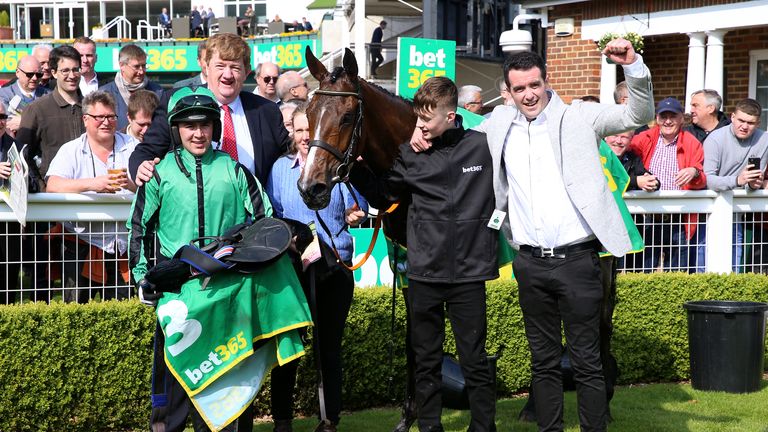 Shark Hanlon (red tie) celebrates Hewick's victory in the bet365 Gold Cup at Sandown