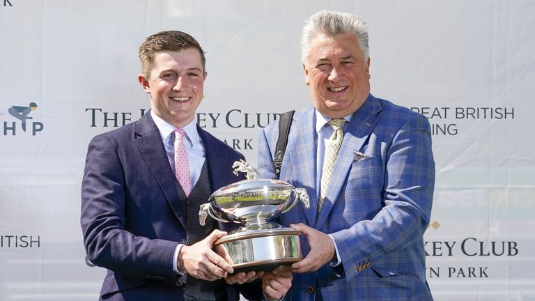 Harry Derham (left) with Paul Nicholls at Sandown as they celebrate winning the trainers championship
