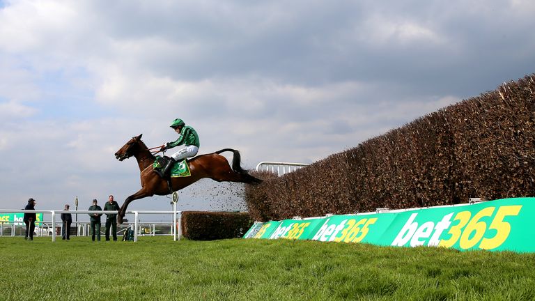 Hewick clears the last in the bet365 Gold Cup at Sandown